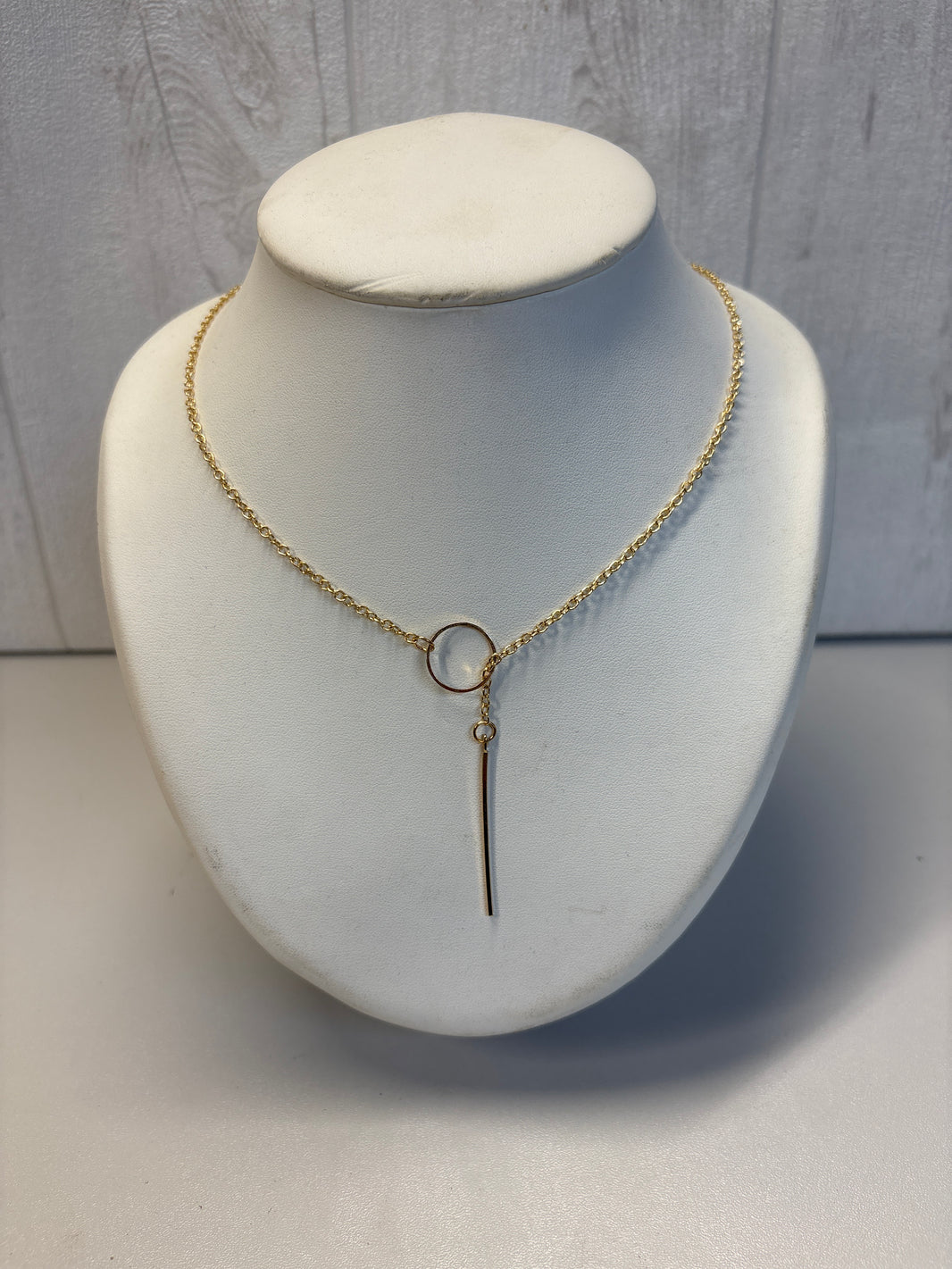 Collier tombant doré