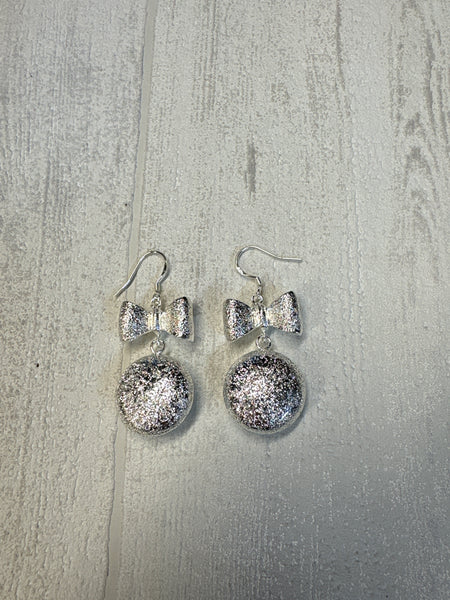 Boucle d’oreille / Noeuf papillon argenté