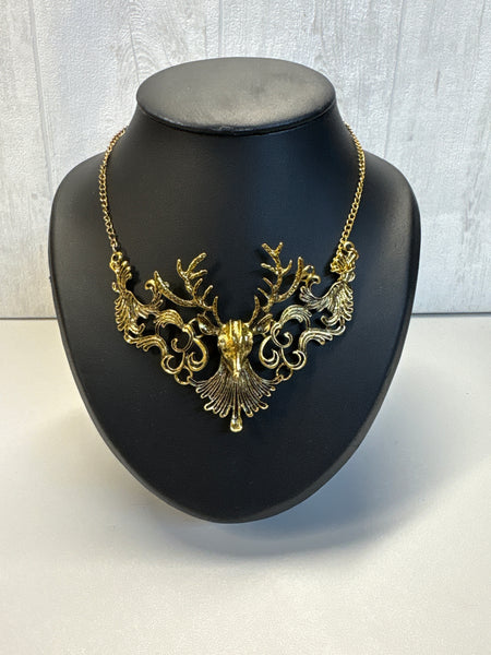 Collier doré tête de cerf