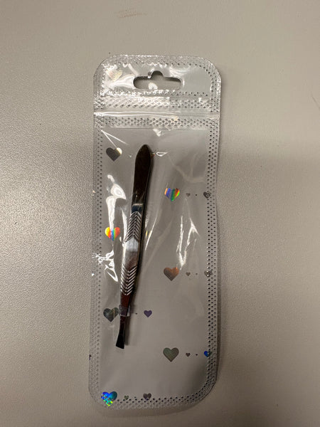 1 pince à épiler